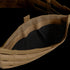 Close-up of the Condor EXO Plate Carrier Gen II in tan, featuring MOLLE webbing and a black interior, displayed against a matching brown background.